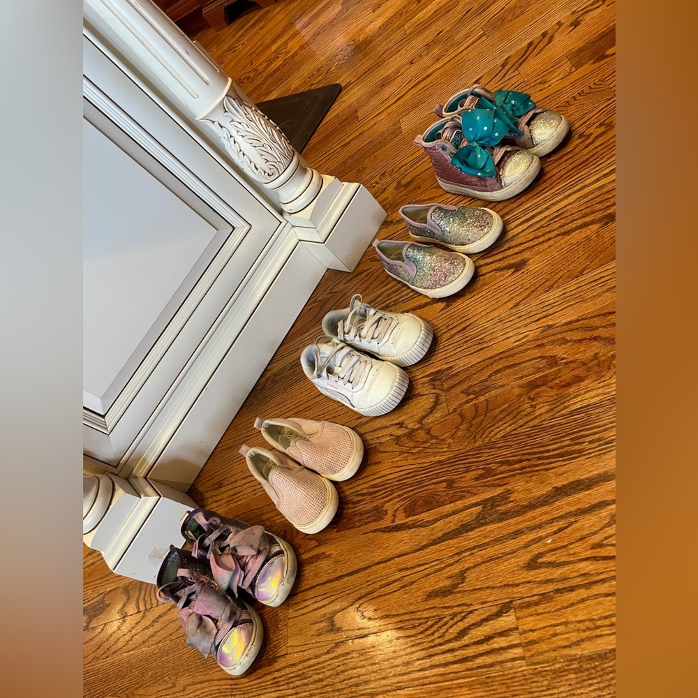 Five pair of girls sneakers